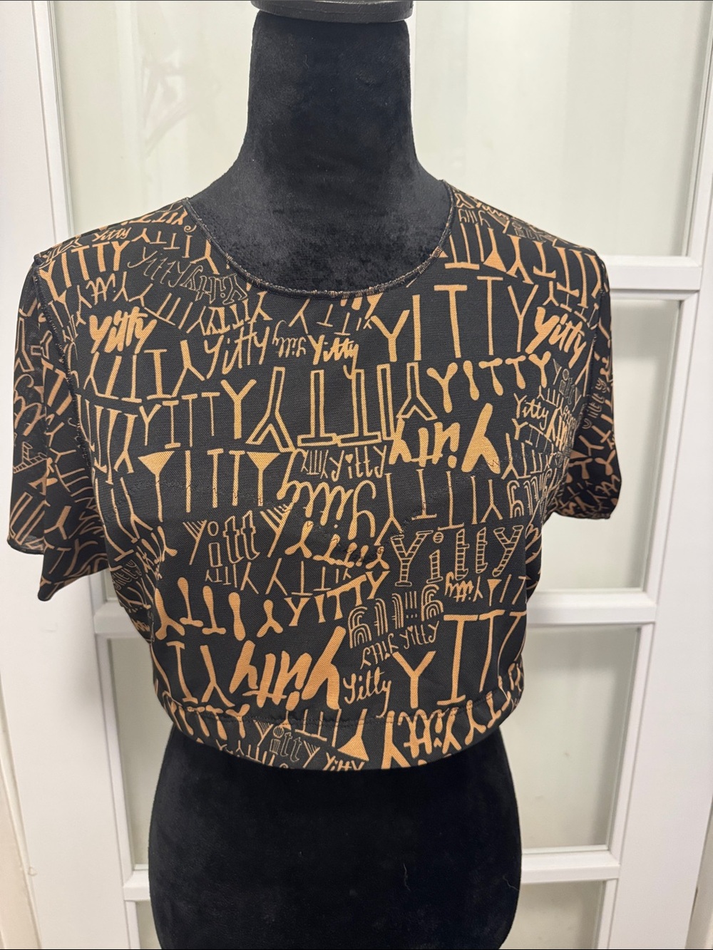 Kitti Black and Tan Graphic Crop Top